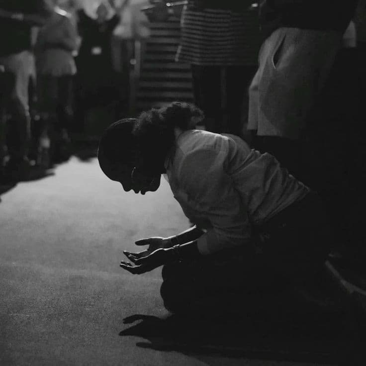 A woman praying in church - Enduring stupidity of a Married Wife
